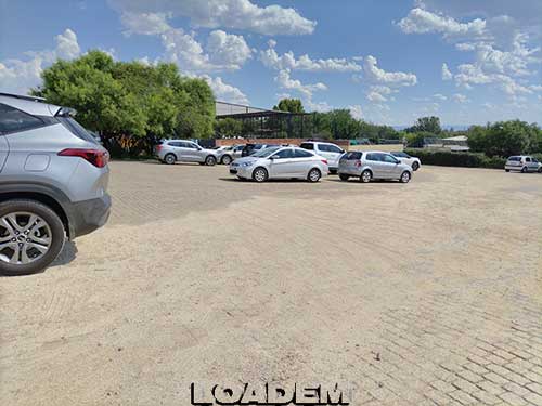 Parking lot for cars at the Lory Park Zoo & Bird Sanctuary top 10 green areas and parks in Midrand 
